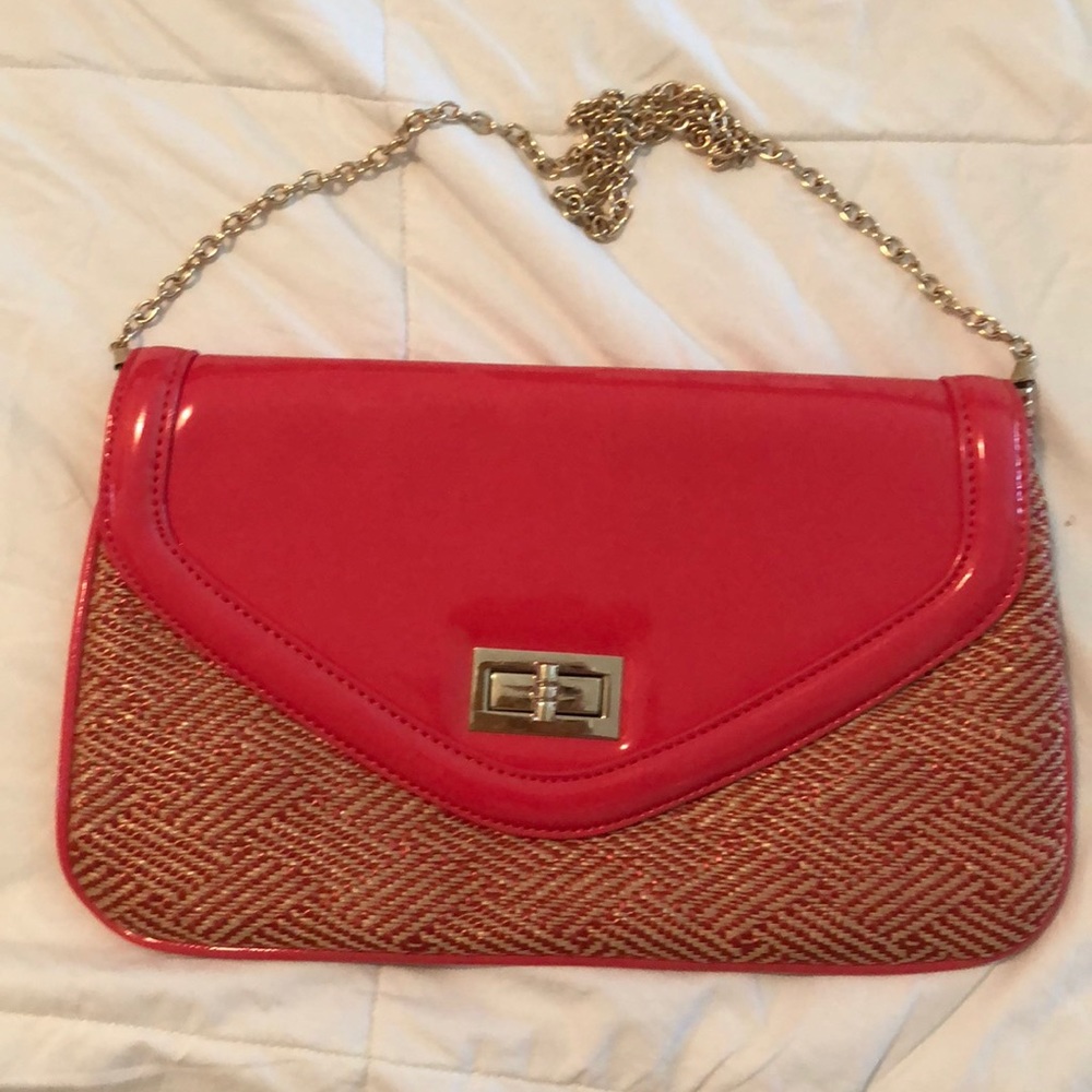 Coral colored Aldo clutch